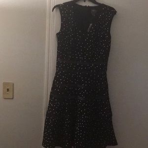 Brand new, medium Taylor, polkadot dress with decorative cut out